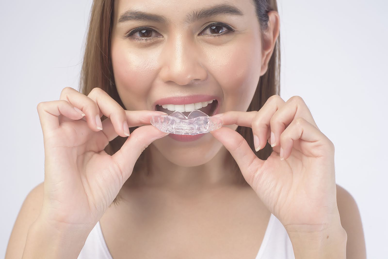Invisalign aligners used during step-by-step treatment procedure