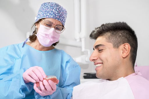 Orthodontist showing Invisalign treatment plan